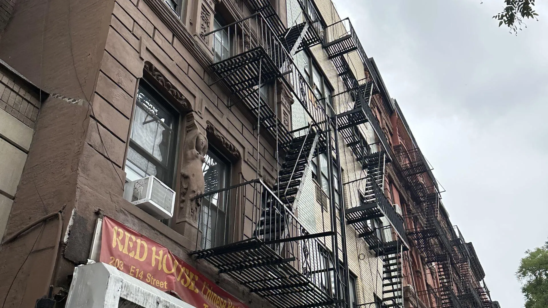 Licensed contractor performing Local Law 11 facade inspection on a New York City building