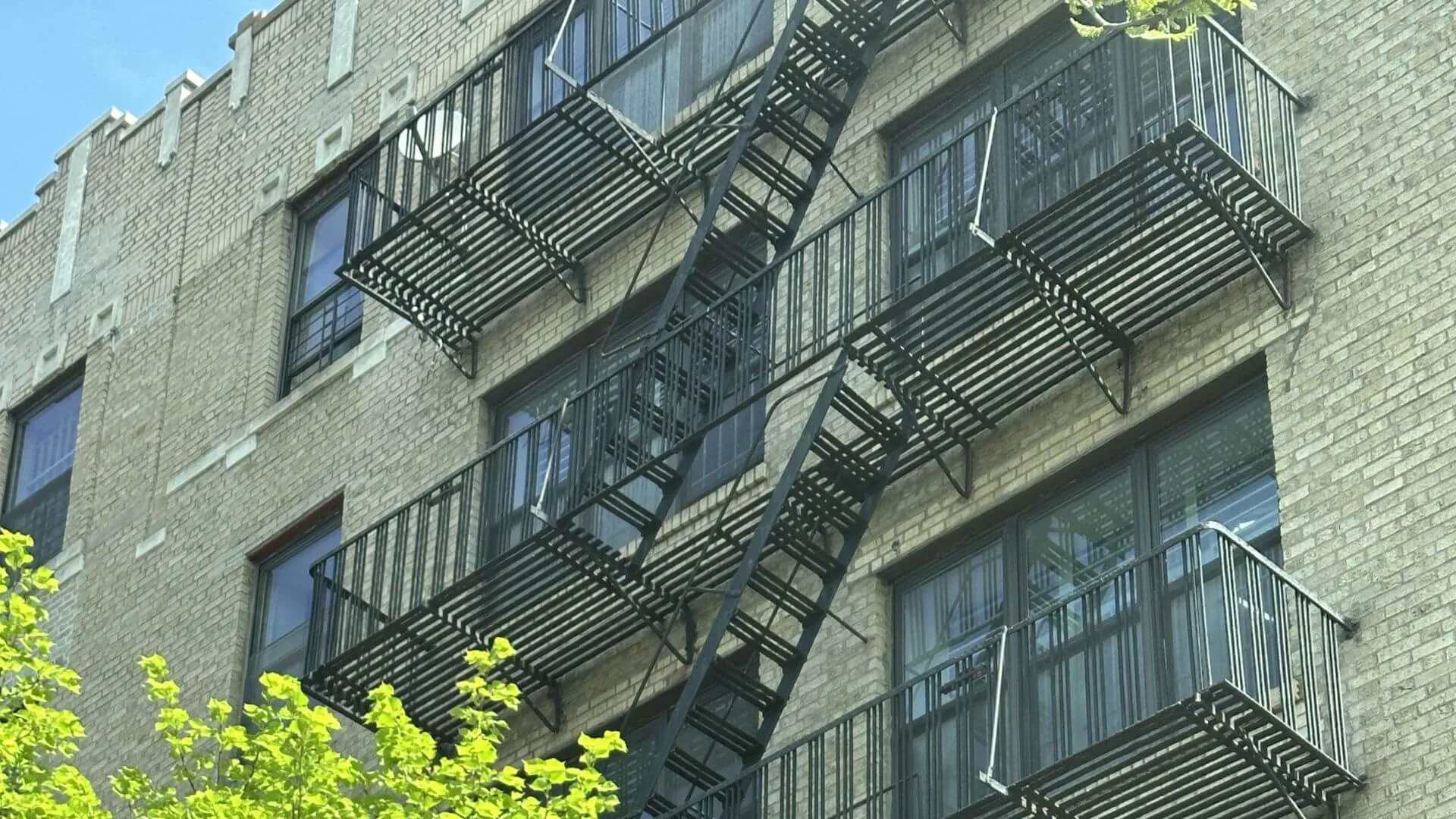 fire escape railing undergoing structural repair in New York City